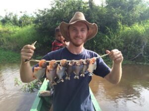 Nick on a fishing trip catching many fish